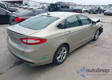 2015 Ford Fusion Energi Titanium from USA, damaged, VIN 3FA6P0SU3FR114739
